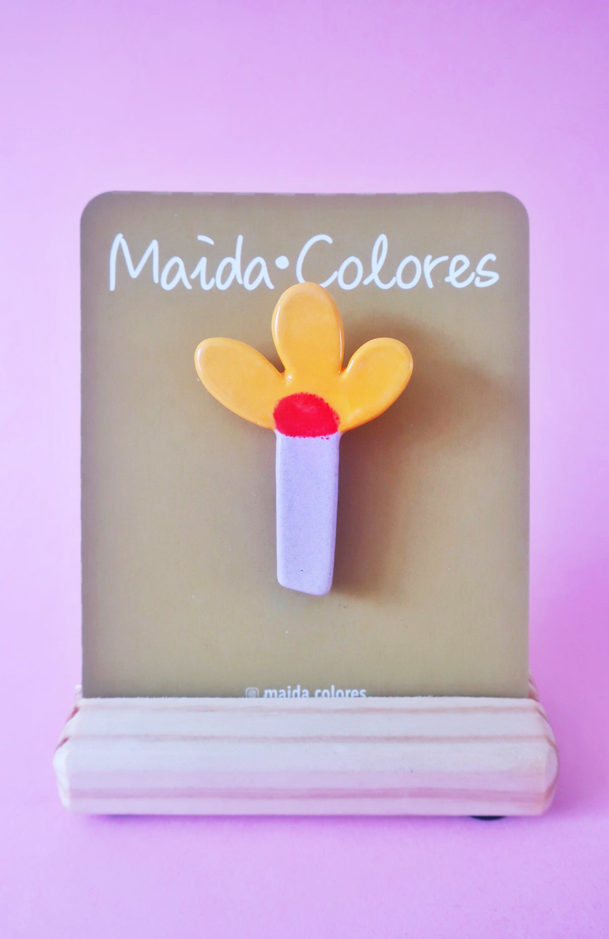 Prendedor lila amarillo